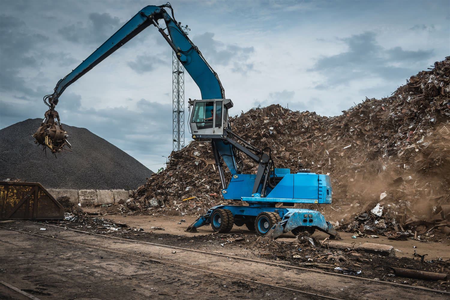 Material handler working the scrap yard